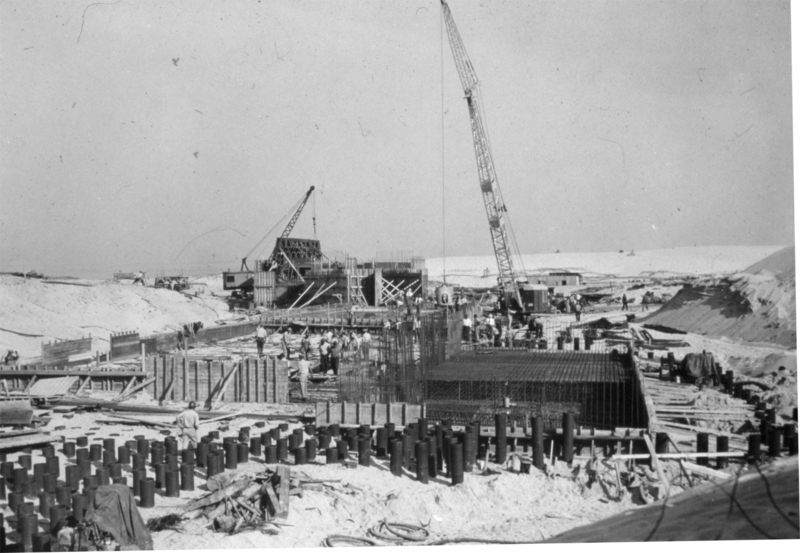 This historical photo from 1941 shows construction of Battery Smith, the largest at Fort Miles. When the superstructure of the battery was complete, everything was covered with sand.